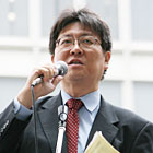 写真：株主総会参加前に決意表明する吉田委員長